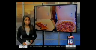 Illustration for article titled Pizza Hut Employees Wrote All Kinds of Racist Stuff on a Pizza Box